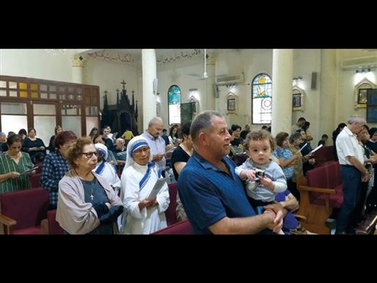 Modlitwa w kościele pw. Świętej Rodziny w Gazie podczas konfliktu